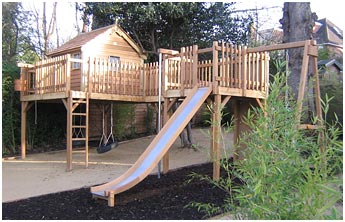 2 station platform treehouse with 6' x 6' cedar cottage, slide, tyre swing, wooden swing, climbing wall and fireman's pole